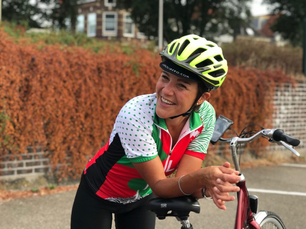 Smiling Girolibero female rider taking a break